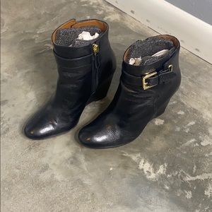 Nine West black and gold buckle wedge booties